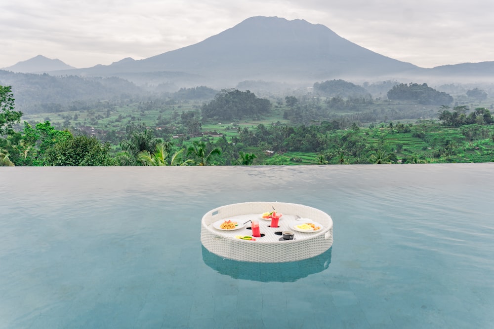 a table that is in the middle of a pool