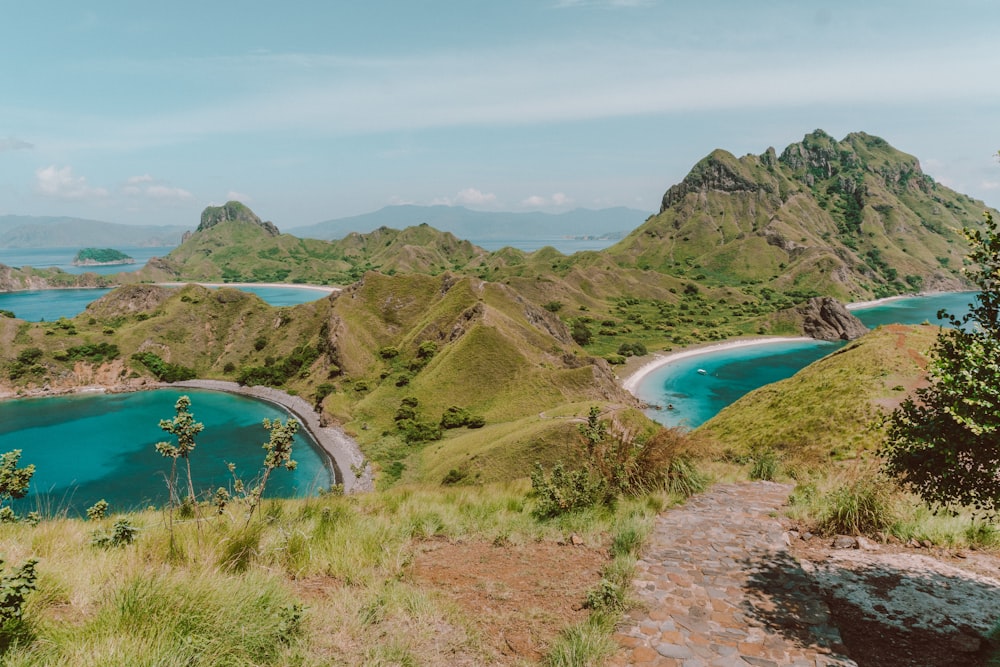 a scenic view of a lagoon and a beach