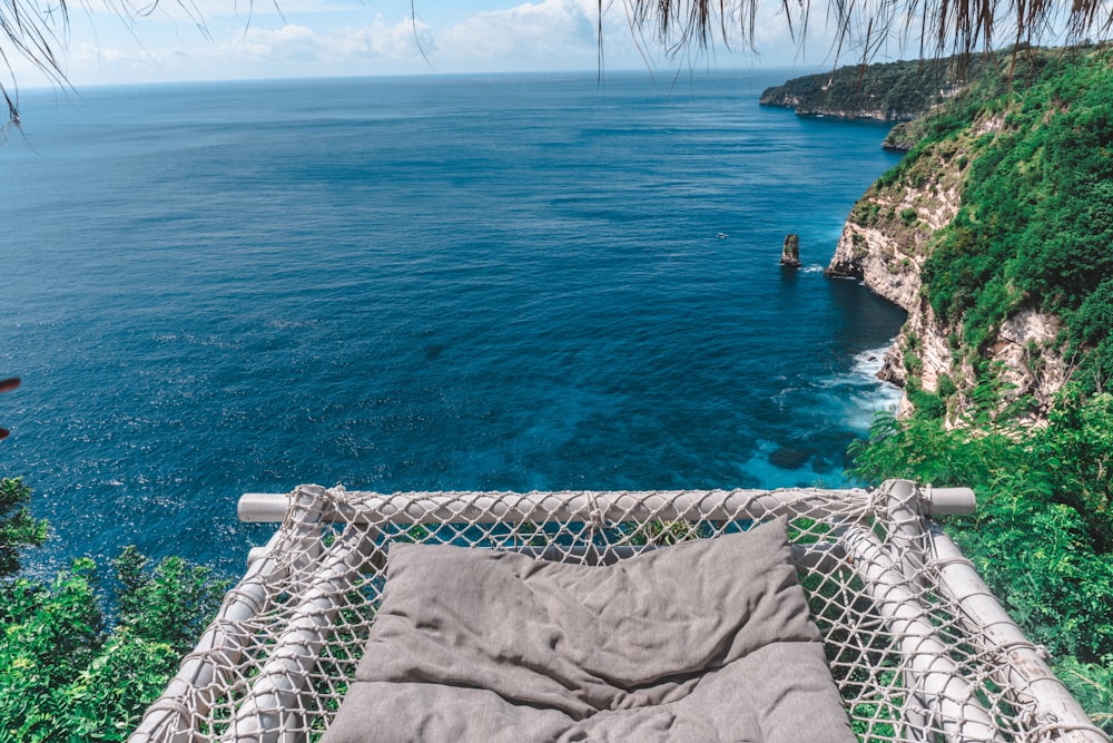 a hammock with a view of the ocean