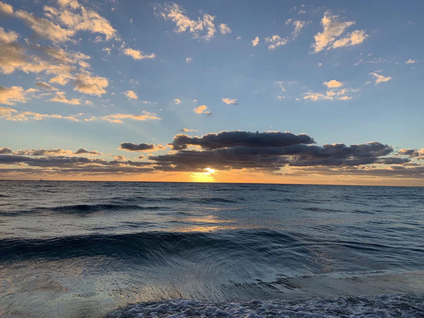 The sun low over the Atlantic, the view early risers get on the Broward coast.