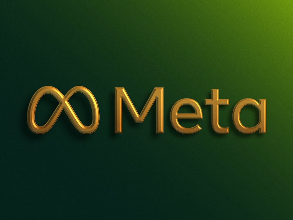 the word meta is written in gold on a green background