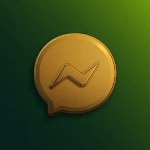 a gold speech bubble with a wave on it