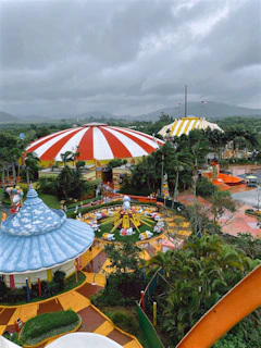 Colorful scenes from a lively day at Hacienda Nápoles theme park.