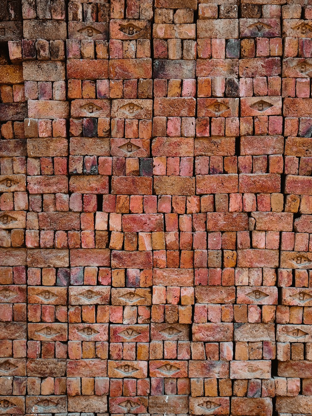 a brick wall made of red bricks