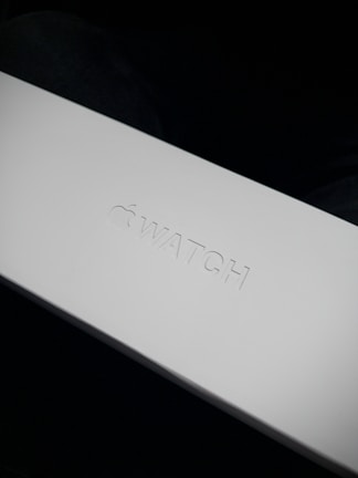 A minimalist tech product packaging embossed with the novv.com emblem.