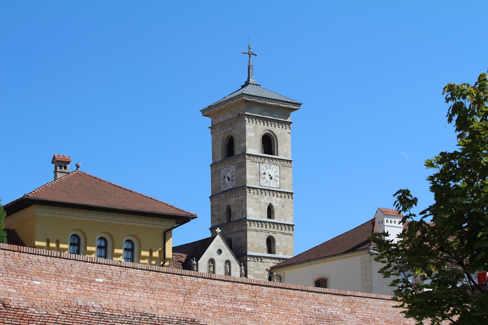 a tall clock tower towering over a city