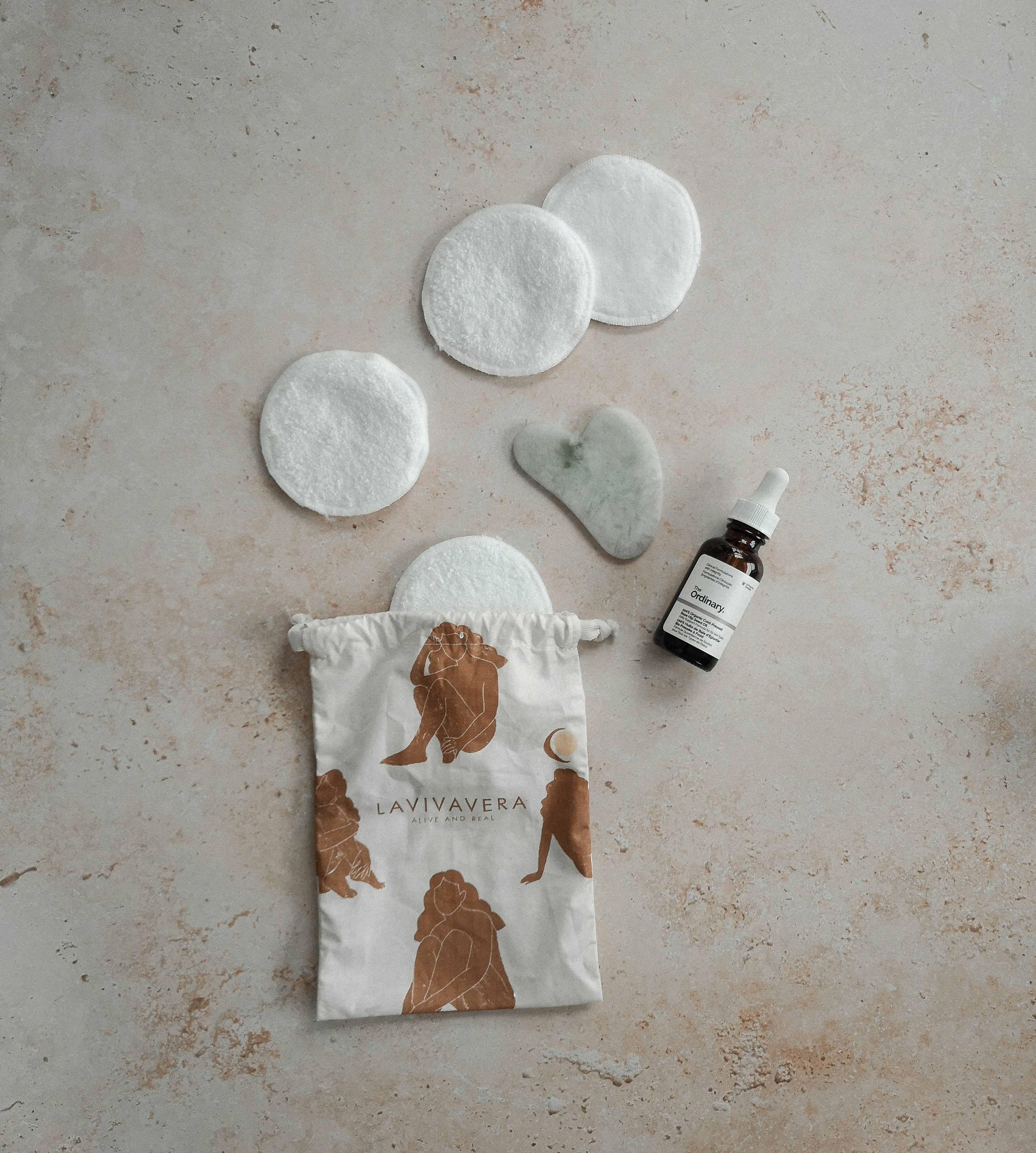 the contents of a bag and a bottle of essential oils