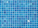 a close up of a blue tiled wall