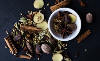 a bowl filled with nuts and spices