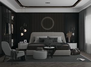 a bedroom with a large bed and a chair