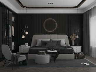 a bedroom with a large bed and a chair