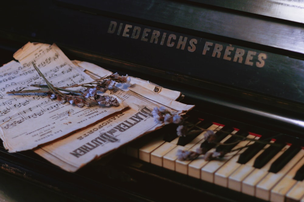 a sheet of music sitting on top of a piano