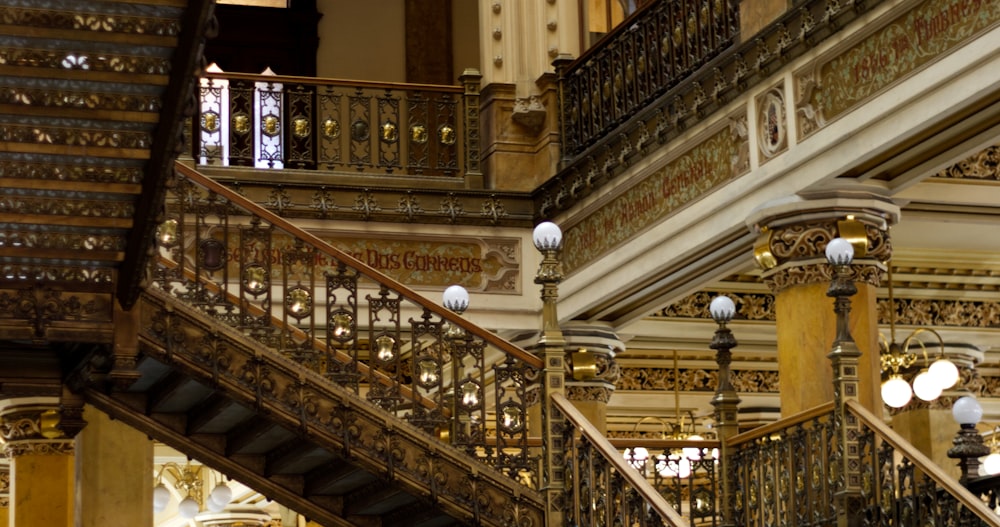 a staircase in a building with a clock on it