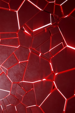 a close up of a mirror with red lights