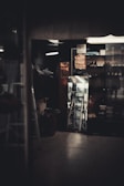 A cozy retail space with warm lighting showcasing different footwear styles.