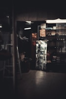 An inviting storefront window showcasing the latest shoe arrivals with soft lighting.