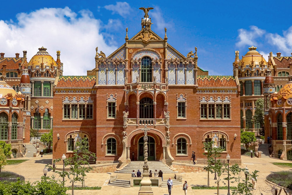 a large brick building with a clock tower on top of it