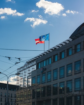 a large building with a flag on top of it