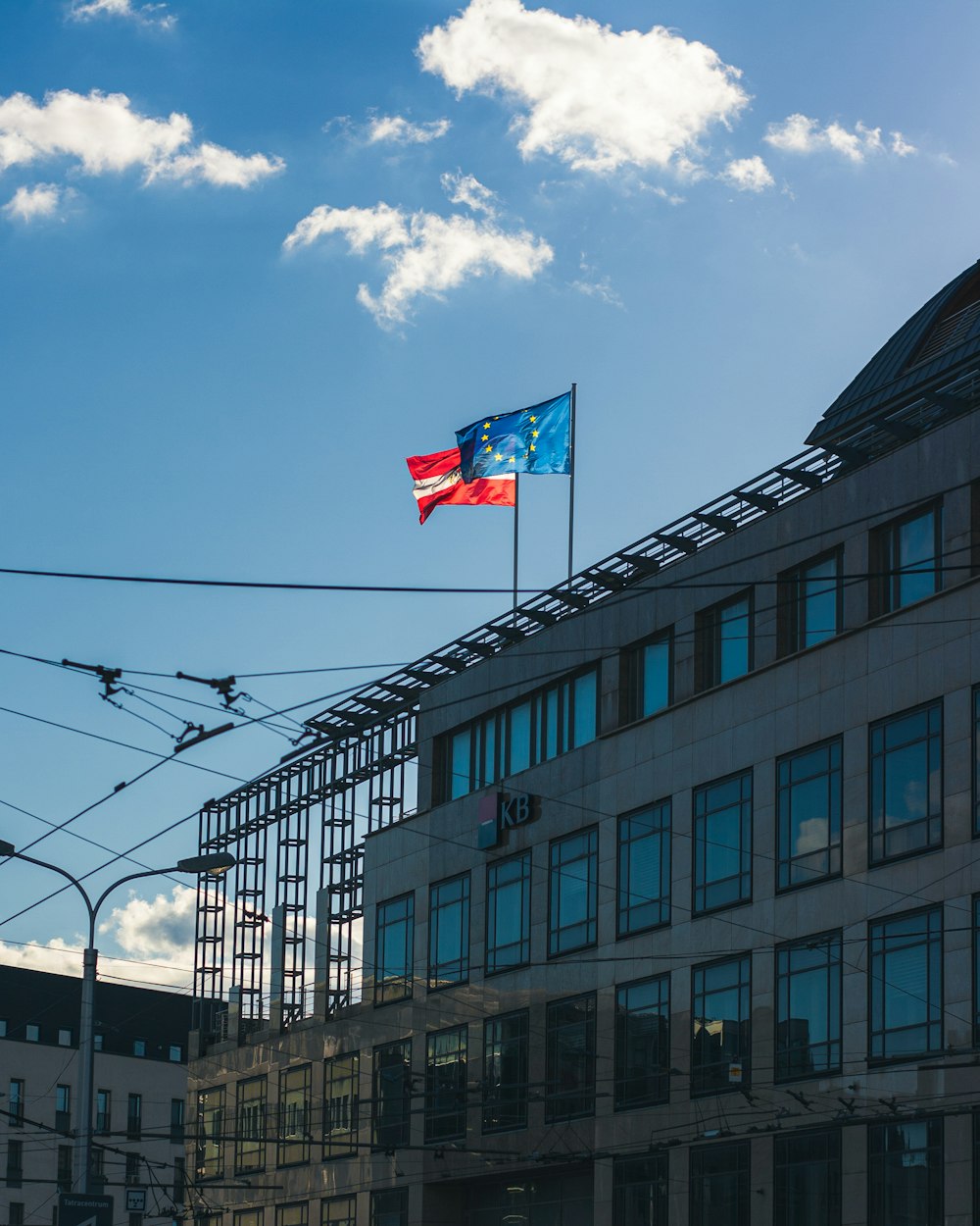 a large building with a flag on top of it