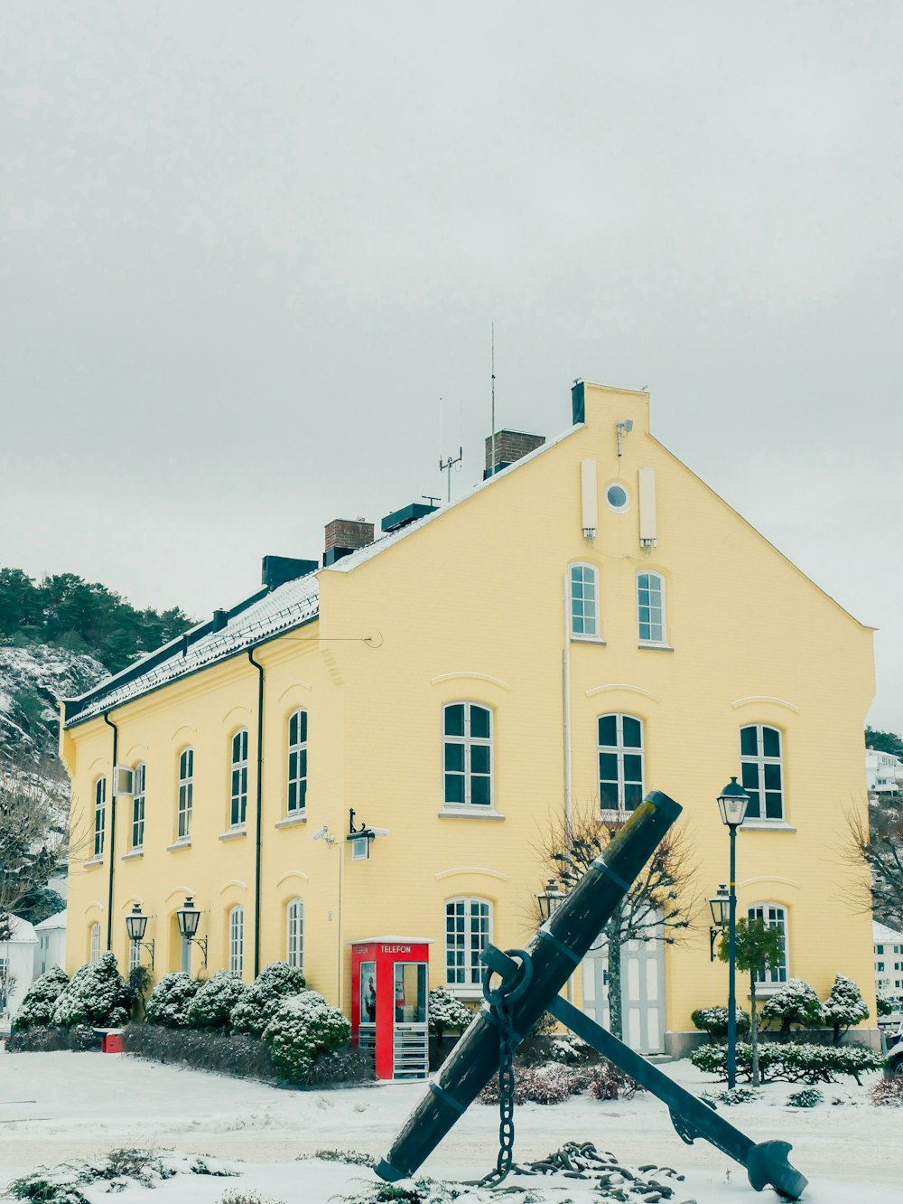 a building that has a large object in front of it