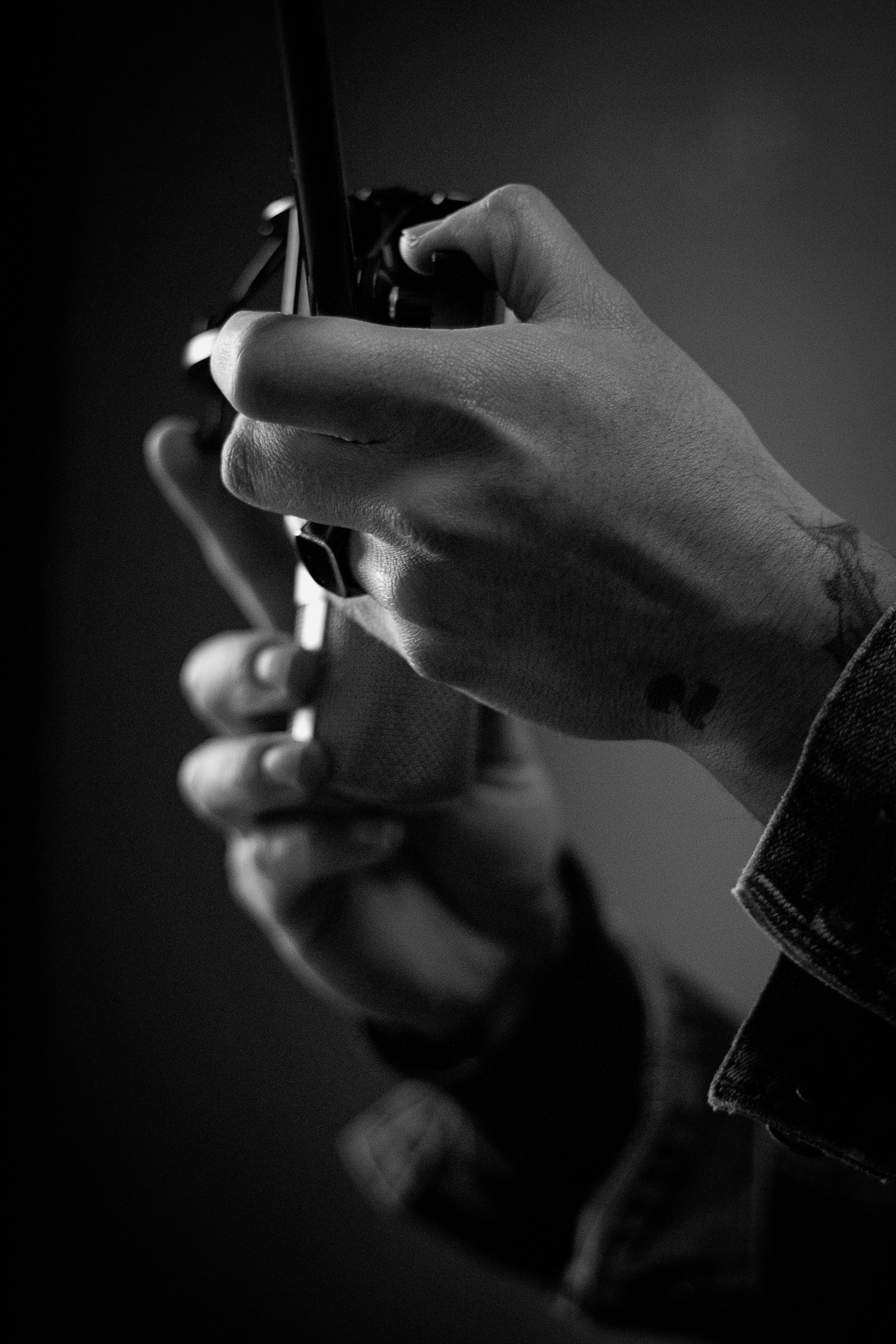 a person holding a cell phone in their hand