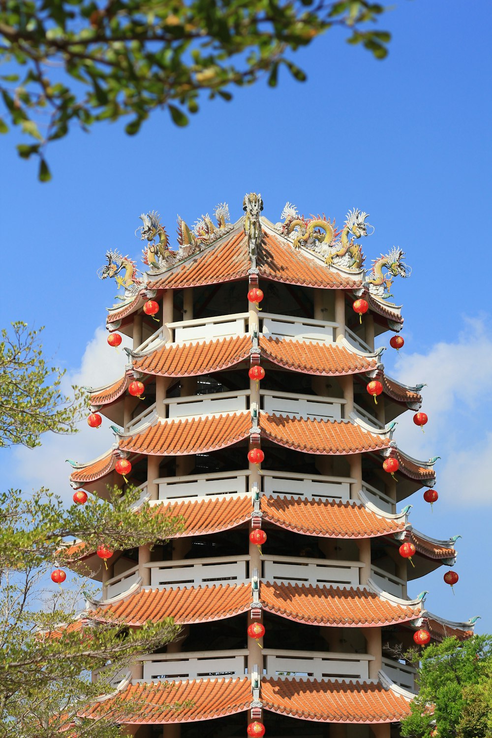 a large building with Yellow Crane Tower in the background