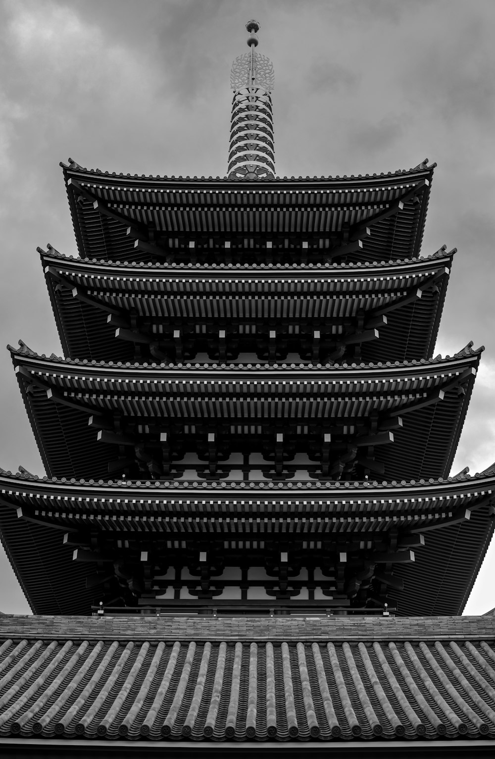 a tall tower with a sky in the background