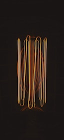 a black background with a bunch of orange lights