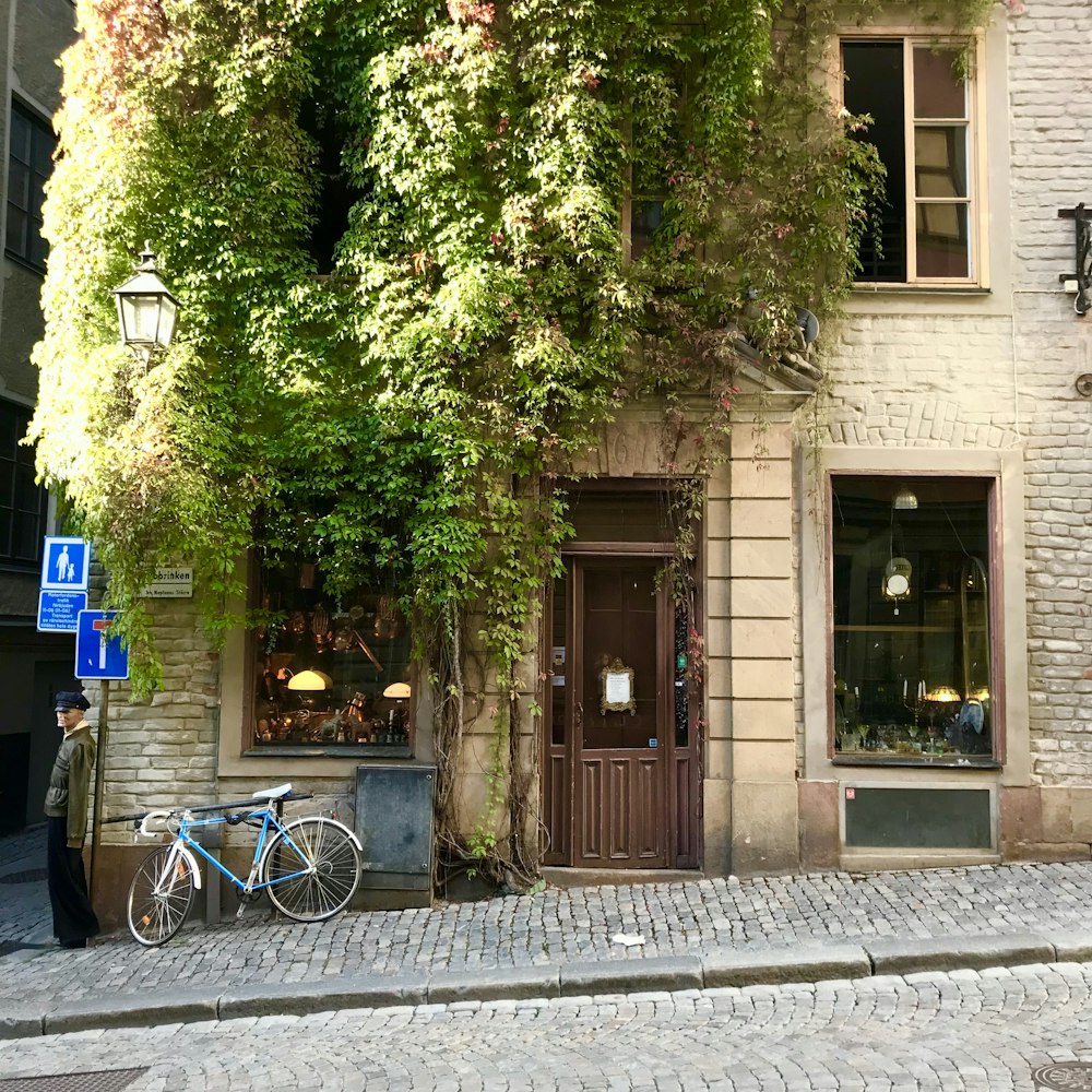 a bicycle parked in front of a building