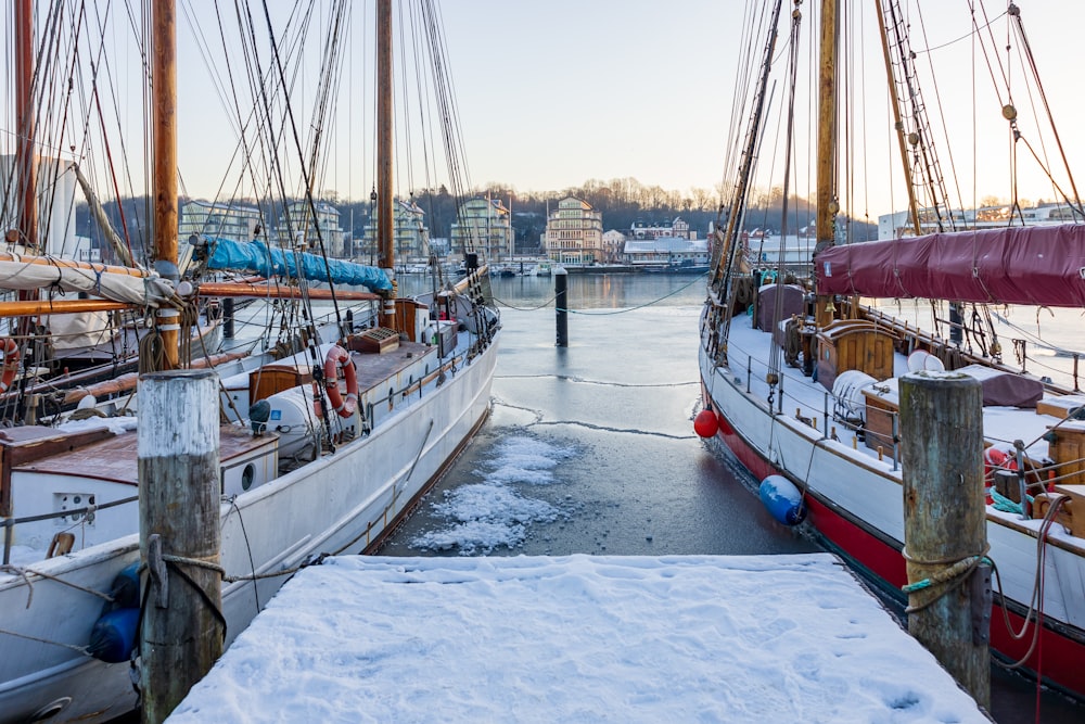 a couple of boats that are sitting in the water