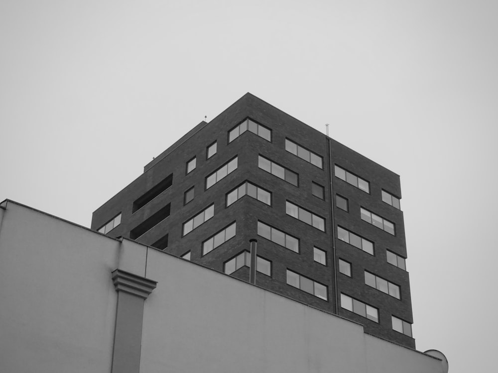 a black and white photo of a tall building