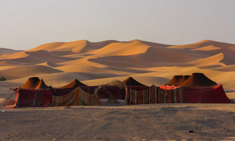 a group of tents set up in the desert