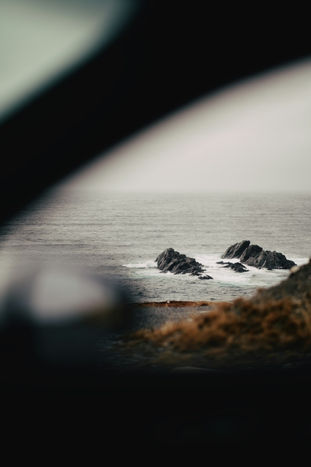 a view of a body of water from a vehicle