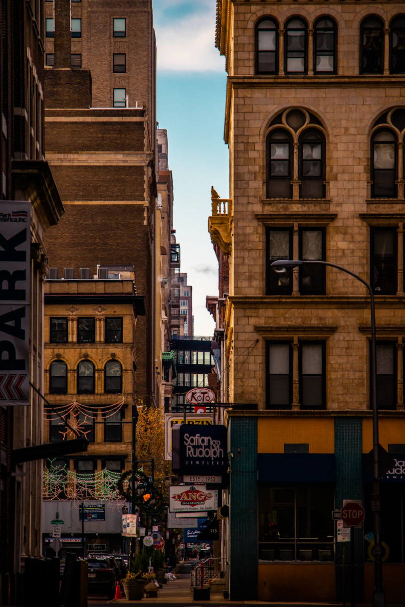 a city street filled with lots of tall buildings