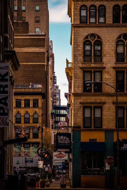 a city street filled with lots of tall buildings