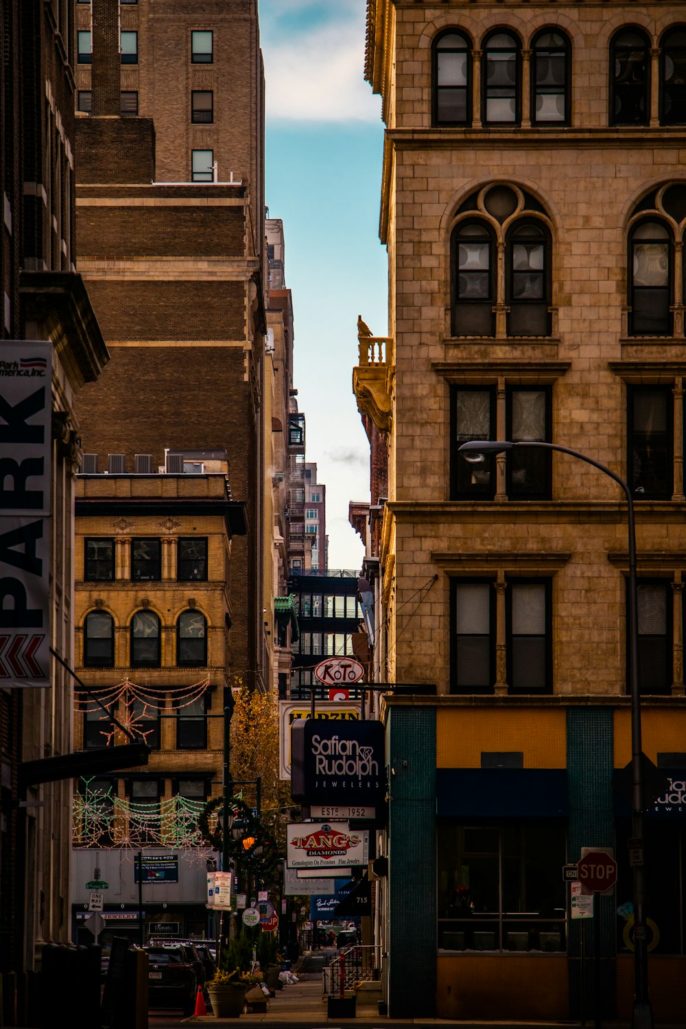 a city street filled with lots of tall buildings