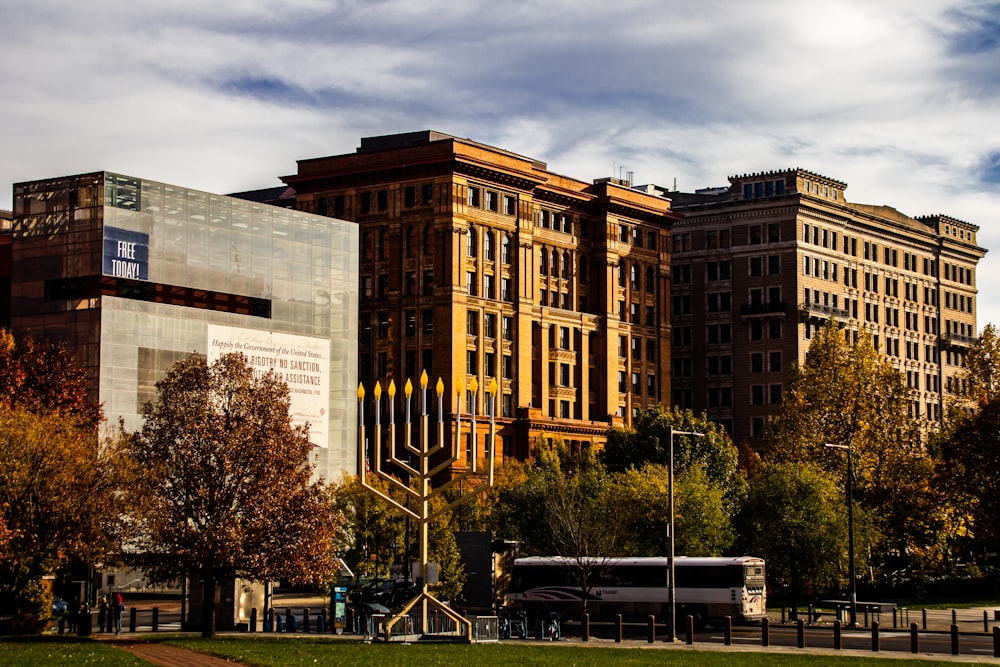 a large building in the middle of a park