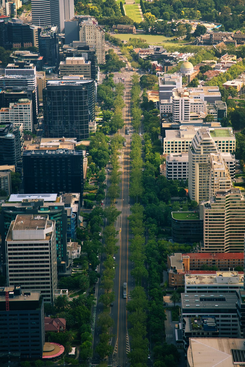 an aerial view of a city with lots of tall buildings