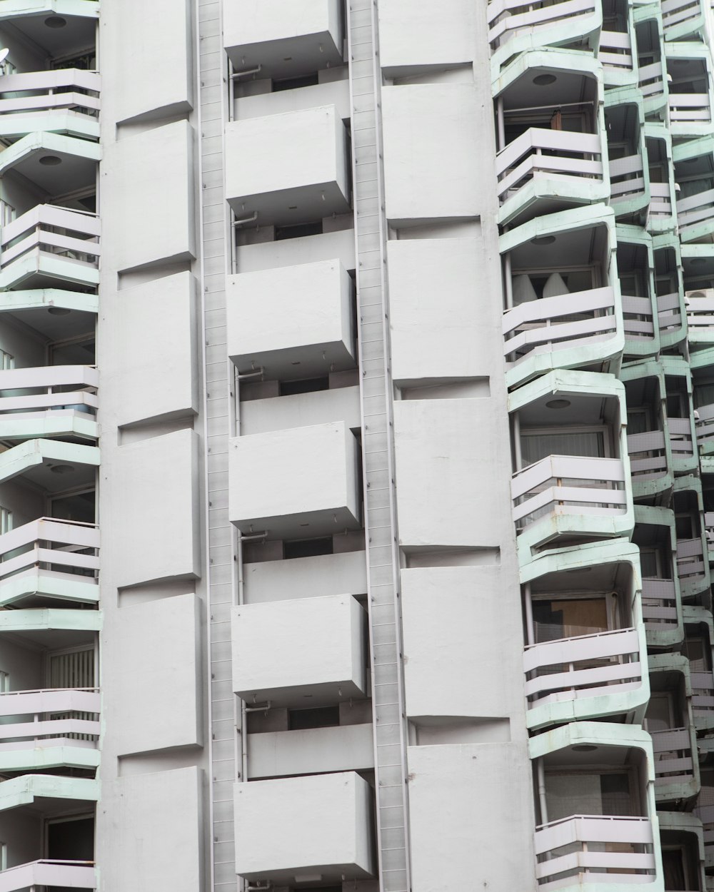 a tall building with balconies and balconies on it