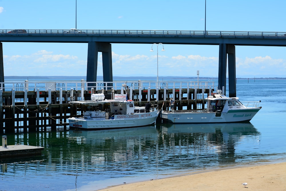 a couple of boats that are sitting in the water