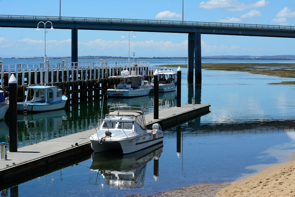 a couple of boats that are sitting in the water