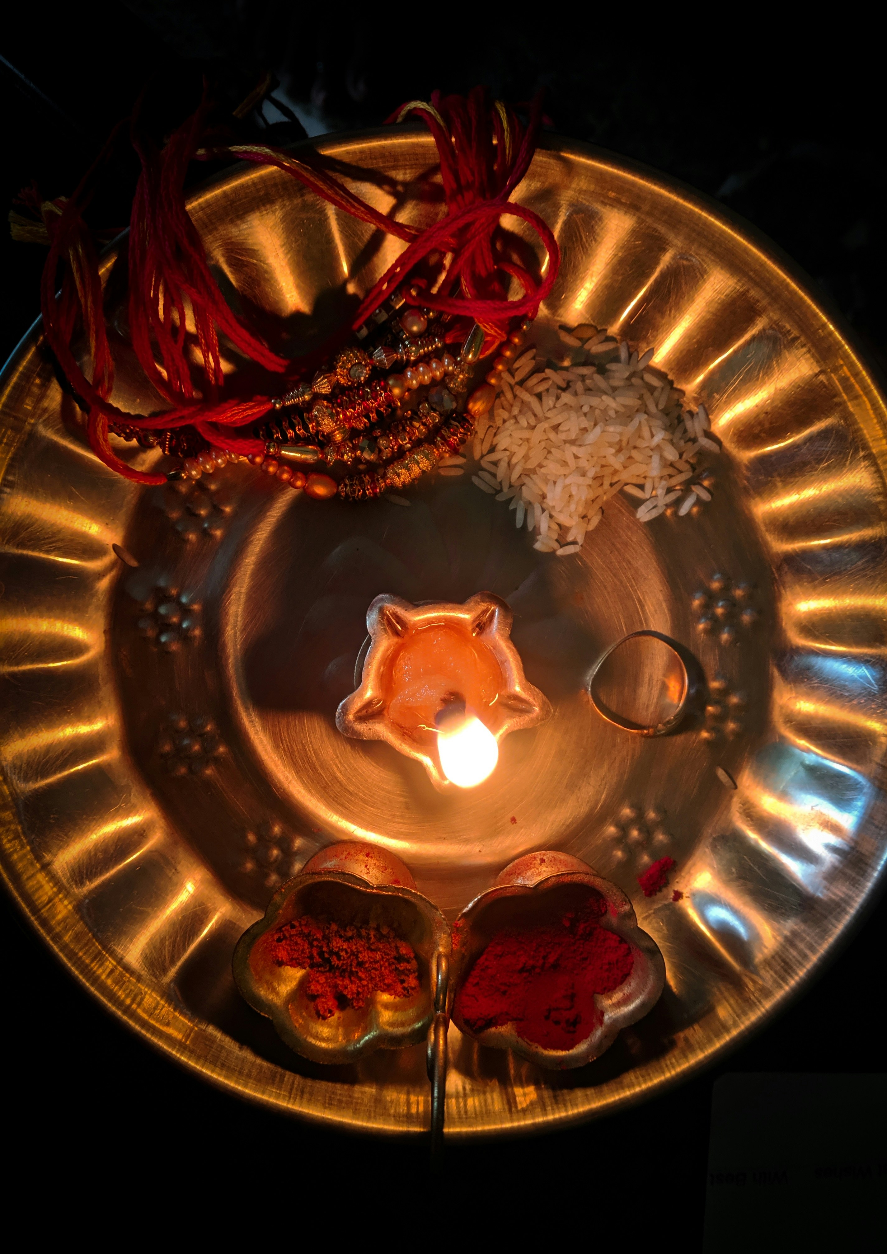 Diwali themed cake with edible diyas, rangoli patterns and golden accents
