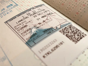 Legal document stamps and signatures on official papers relevant to taxation and immigration