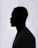 a silhouette of a man in a black shirt