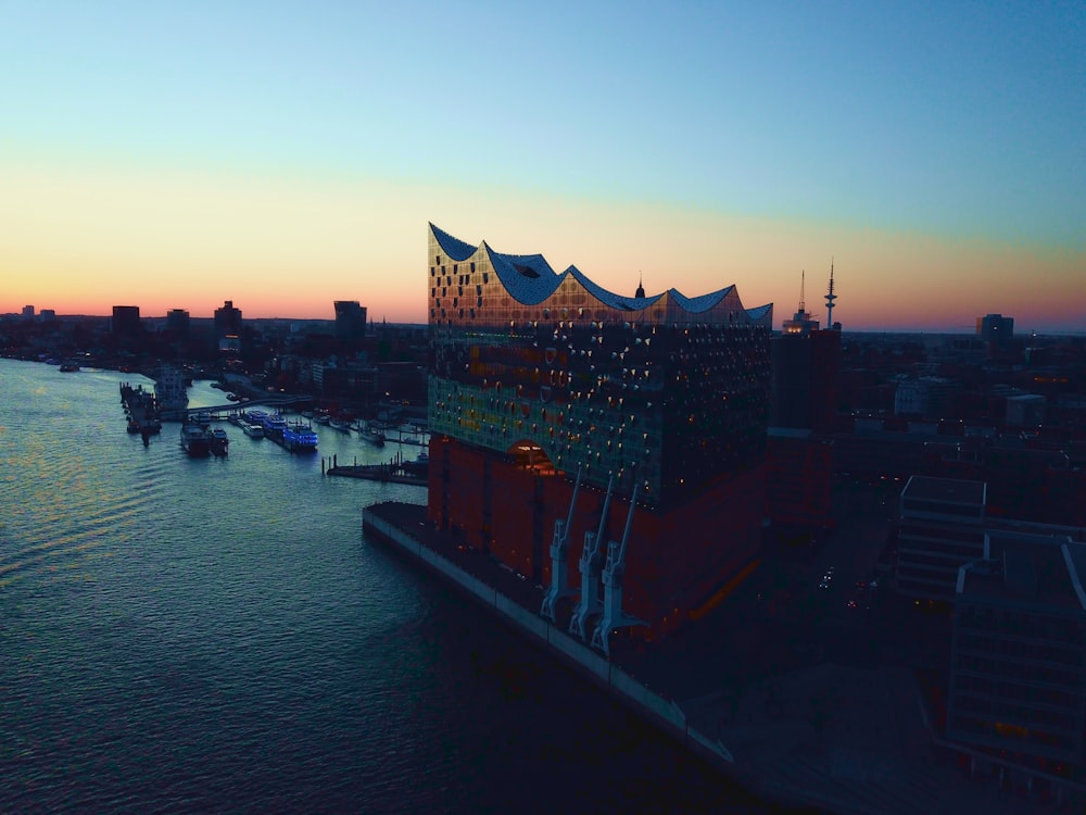 an aerial view of a city at sunset