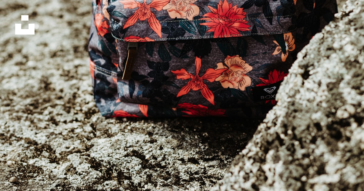 A backpack sitting on top of a large rock photo – Free Россия Image on ...