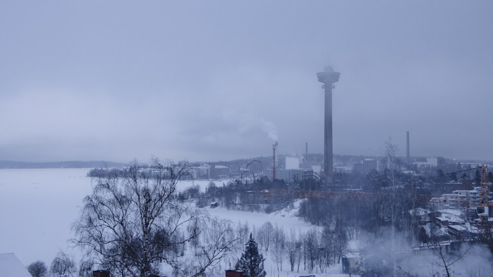 a view of a factory with smoke coming out of it