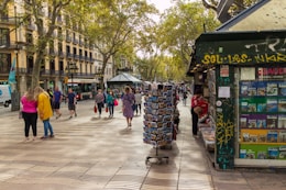 a group of people walking down a street