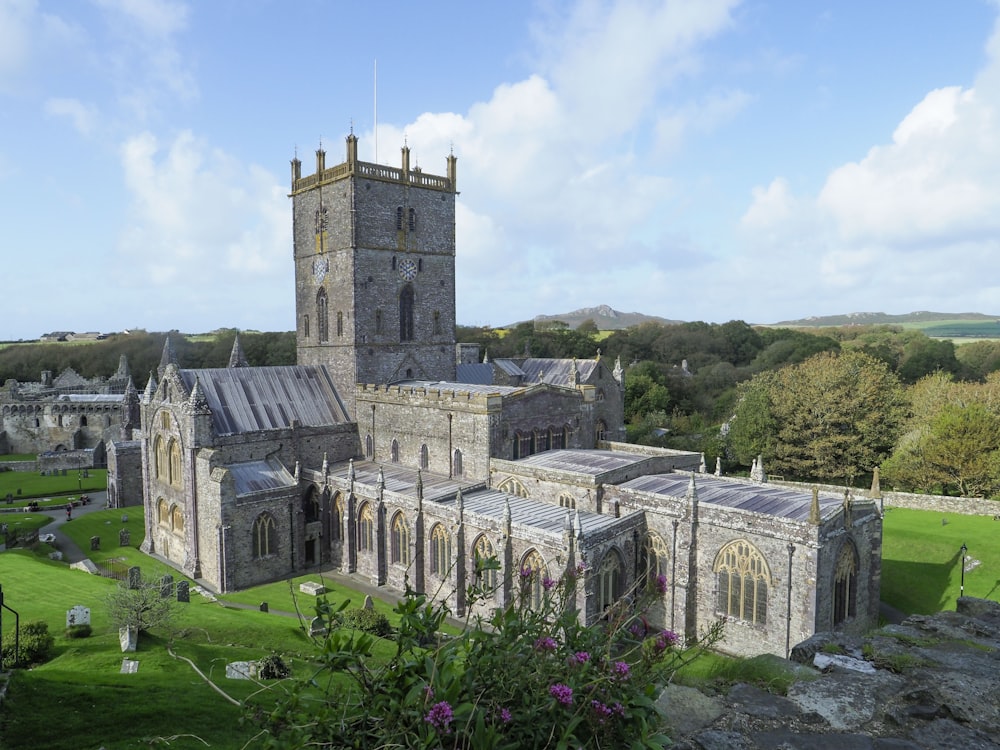 a large stone building with a clock tower