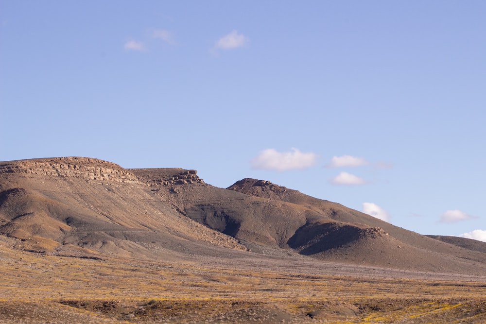 a mountain range in the middle of a desert